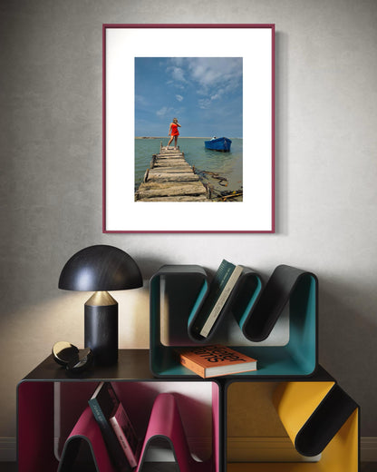 Rustic Pier Photography Print, Coastal Beach House Wall Art, Red Dress and Blue Boat Seascape, Limited Edition Decor - Banksy Art Inspired