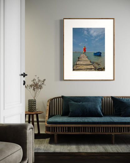 Rustic Pier Photography Print, Coastal Beach House Wall Art, Red Dress and Blue Boat Seascape, Limited Edition Decor - Banksy Art Inspired