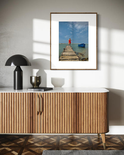 Rustic Pier Photography Print, Coastal Beach House Wall Art, Red Dress and Blue Boat Seascape, Limited Edition Decor - Banksy Art Inspired